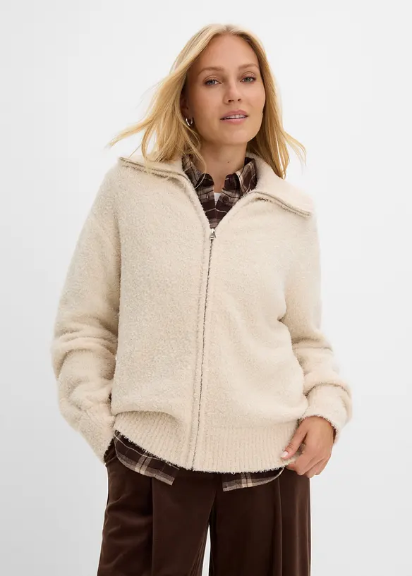 Bouclé-Strickjacke in beige von vorne (im Anschnitt) - bonprix