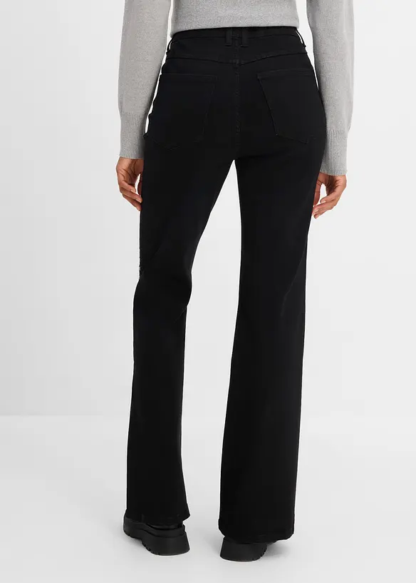 Flared-Jeans High Waist mit Nietenbesatz in schwarz von hinten - bonprix