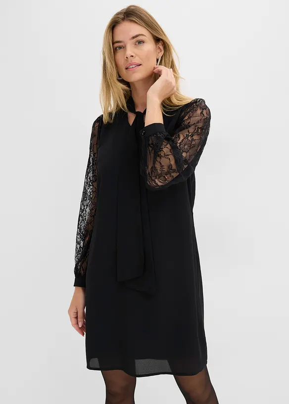 Blusenkleid mit Spitzenärmel in schwarz von vorne (Totalaufnahme) - bonprix