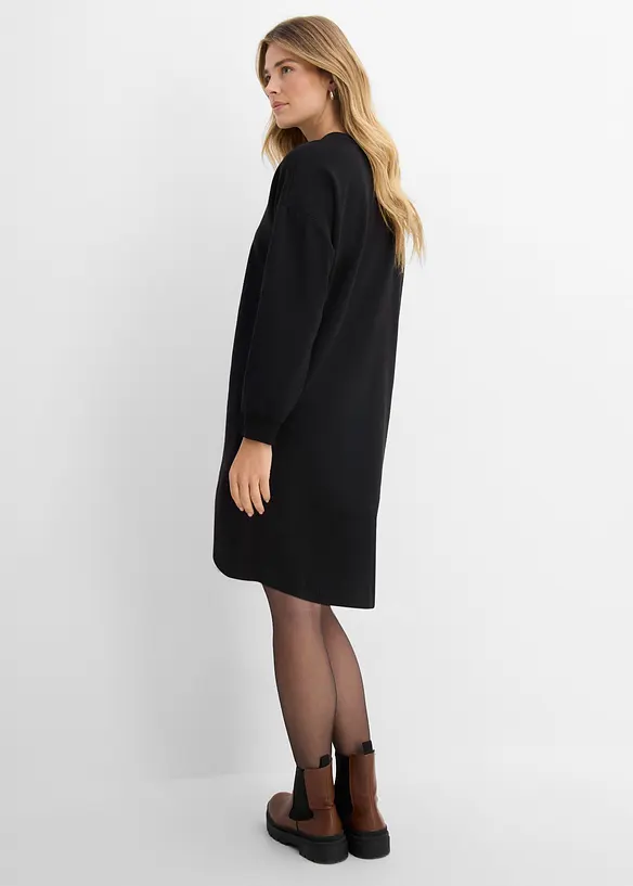 Oversized Sweatkleid in schwarz von hinten (Totalaufnahme) - bonprix