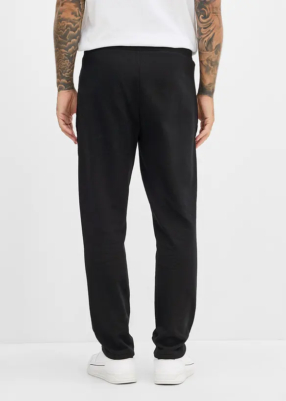 Jogginghose aus reiner Baumwolle in schwarz von hinten - bonprix