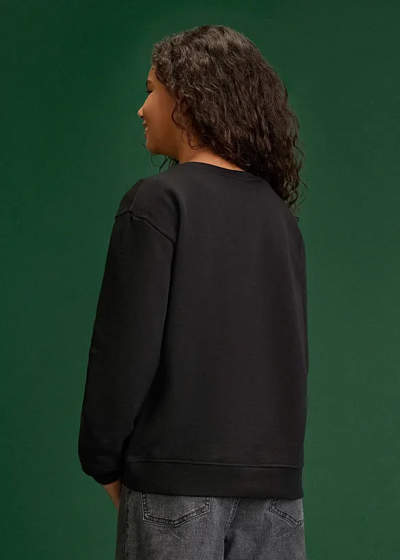 Sweatshirt mit Weihnachtsmotiv aus reiner Bio-Baumwolle in schwarz von hinten (im Anschnitt) - bonprix