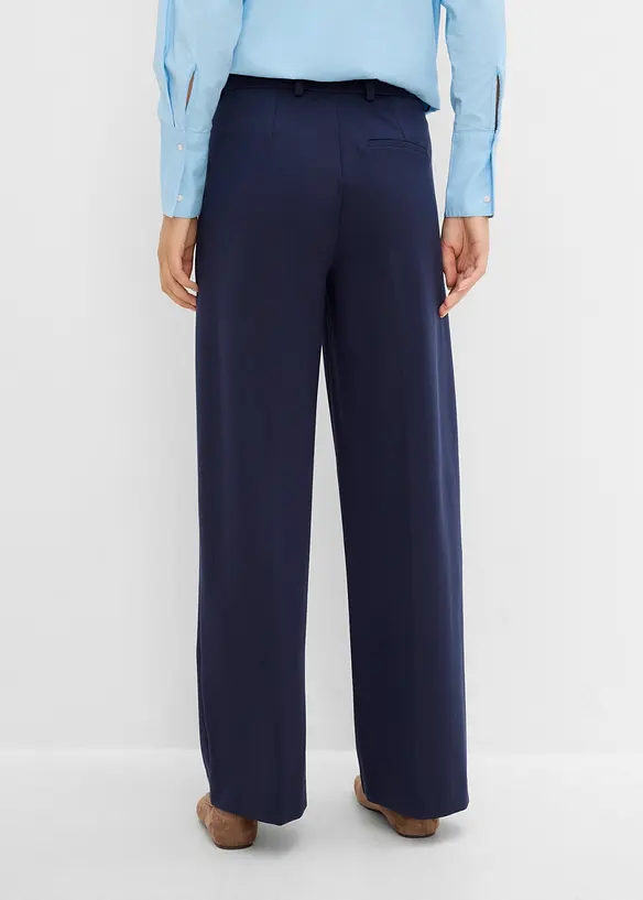 Bundfaltenhose aus bequemen Punto di Roma in blau von hinten - bonprix