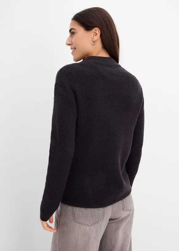 Feinstrickjacke in schwarz von hinten (im Anschnitt) - bonprix